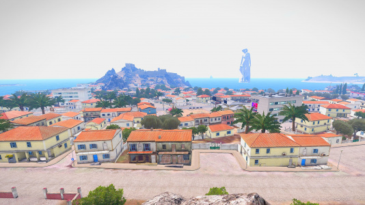 A view of Kavala shows the towering statue and ancient Phoenician ruins.